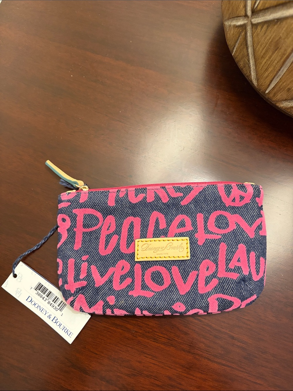 Dooney & Bourke Navy Canvas Wristlet with Pink Graffiti Script